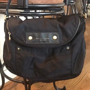 MARC JACOBS NY black bag with gold hardware.